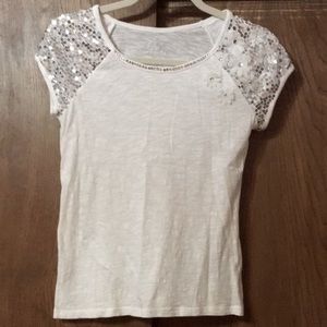 Girl’s white sparkly top